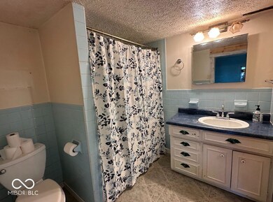 Main floor bathroom connected to the bedroom