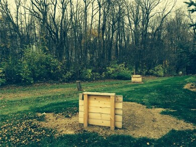 Backyard with horse shoe pit