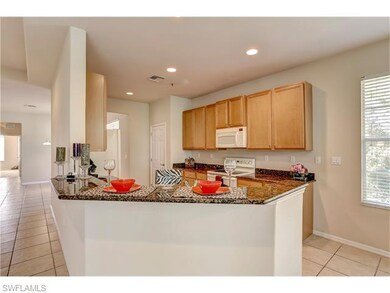 12870 Carrington Cir unit 201, Naples, FL 34105 - photo 2