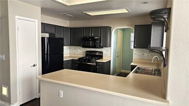 Step saver kitchen with a pantry.