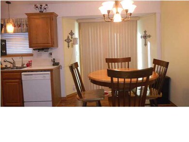 Dining area adjacent to kitchen.