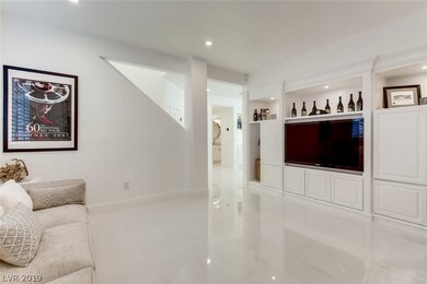 Seccond living room off of the kitchen area.   Gre
