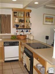 Another view of the kitchen with all it storage an