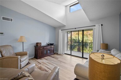 Living room featuring light hardwood / wood-style 