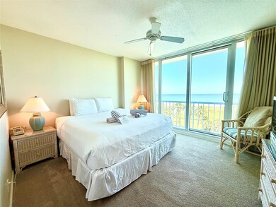 Primary Bedroom overlooking the pool and the Gulf.