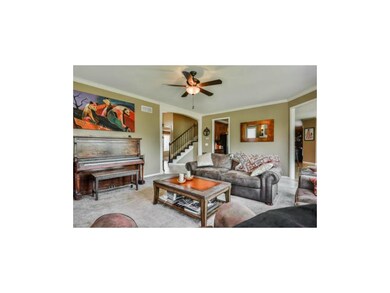 Lighted ceiling fan and crown moulding. Easy acces