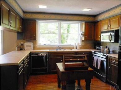 Large Kitchen Offers Plenty of Counterspace and Cabinets...