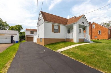Black top drive way with ample parking