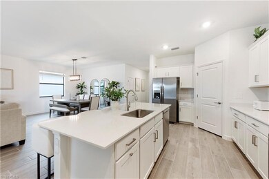 Kitchen featuring visible vents, appliances with s