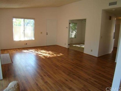 Living room, looking at the front door.
