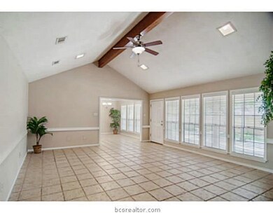 Living Room. A wall of windows fills this generous
