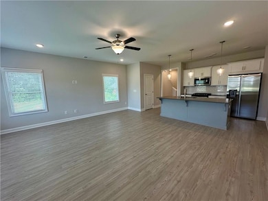 Kitchen featuring appliances with stainless steel 