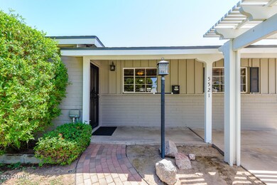 Entry with charming brick walkway