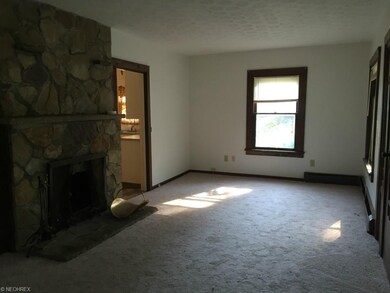 Wood Burning Fireplace in spacious Living room.