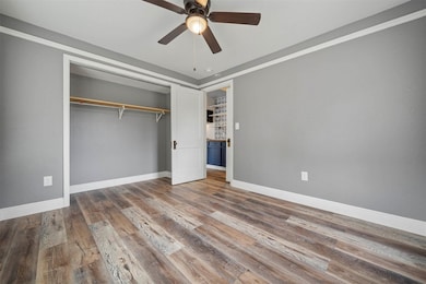 Another view of the primary bedroom.