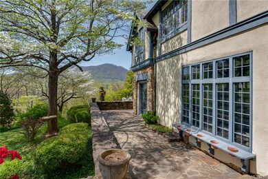 Rock walkway that extends around the home w/ mount