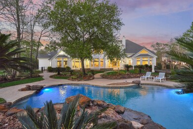 Pool/spa complete with gorgeous flower beds that surround, LED color lighting & rock waterfalls.