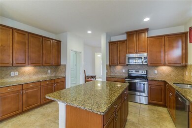 Kitchen features added storage and coffee bar area
