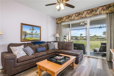 Living area featuring wood finished floors and cei