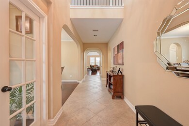 Upon entering the home you are greeted by a two story entryway