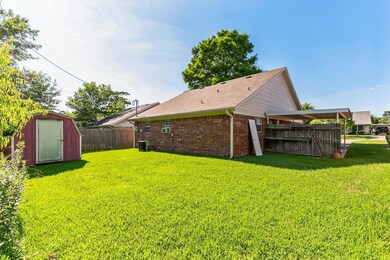 View of yard featuring a shed