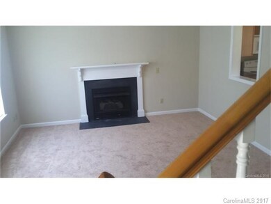 Living room with fireplace with gas logs