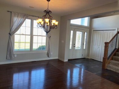 View of Dining Room and Front Entrance