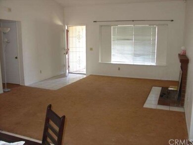 Entry and LR with Fireplace and Window Seat