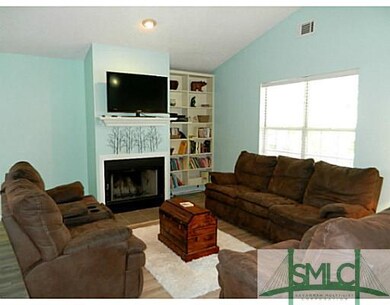 Living Room. Vaulted ceiling and wood burning fire