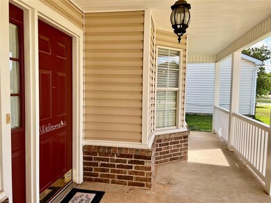 Doorway to property with a porch