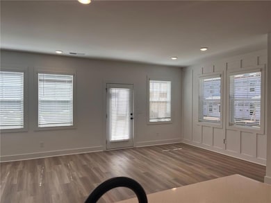 Subject property Dining area has two extra windows/end unit.