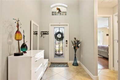 Foyer with vaulted ceiling, full light leaded glas