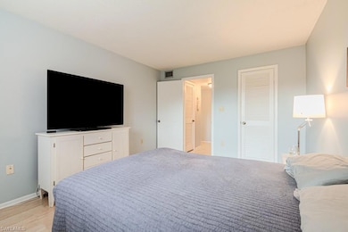 Bedroom with light wood-type flooring