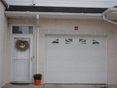 New screen door and 1-car integral garage. Auto ga