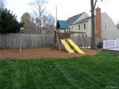 Playground Area tucked neatly along the fence just