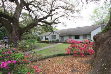 450 Polony Place_front through azaleas.j
