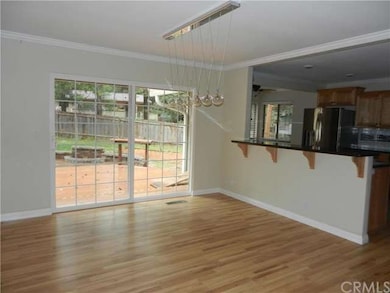 Dining Room with New Lighting & Slider to Deck