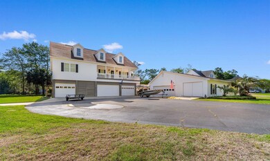 View of front of property featuring a front yard, 
