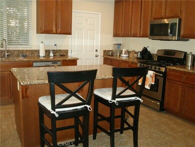 Island with granite and a new kitchen faucet!