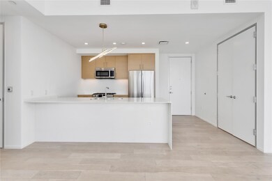Kitchen featuring stainless steel appliances, a s