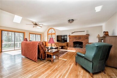 Naturally lit family room with vaulted ceiling, sk