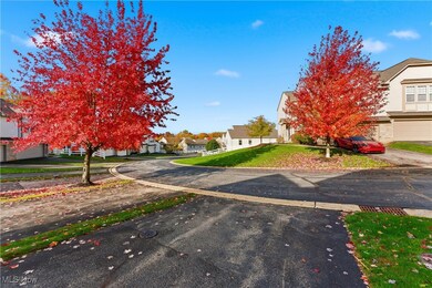 View of asphalt road with a residential view