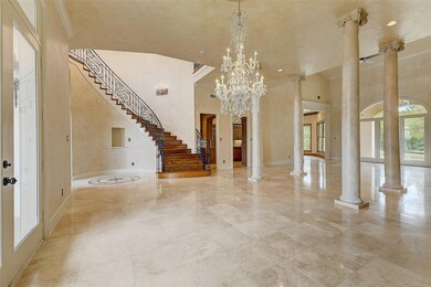 Impressive entry opens onto living areas