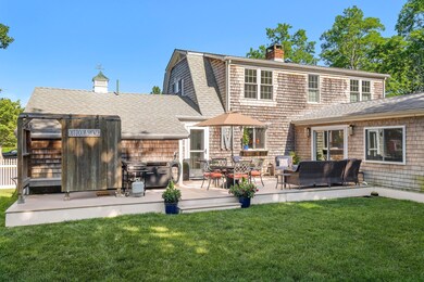 Spacious back deck and outdoor shower
