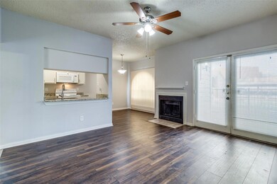 Unfurnished living room featuring dark hardwood / 