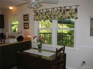 Eat in kitchen area overlooking deck.