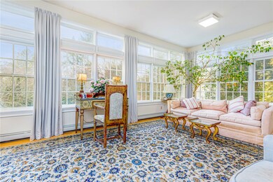 Sun room overlooking half acre yard.