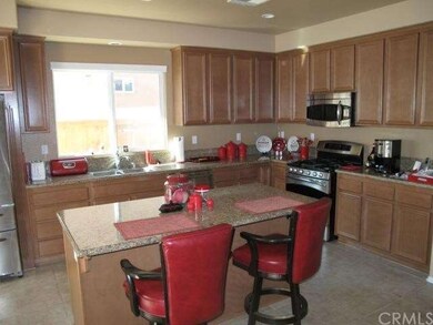 With the kitchen opening to the family room, this 