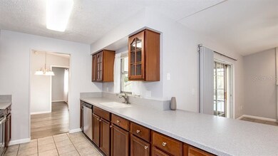 Bright kitchen overlooks the family room and great