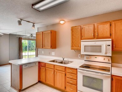 Neutral kitchen with solid oak cabinets and ample 